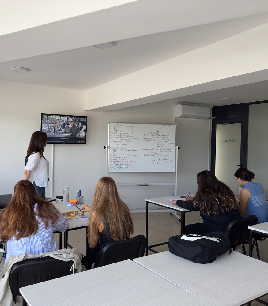 Students in a Poliglo Institute classroom