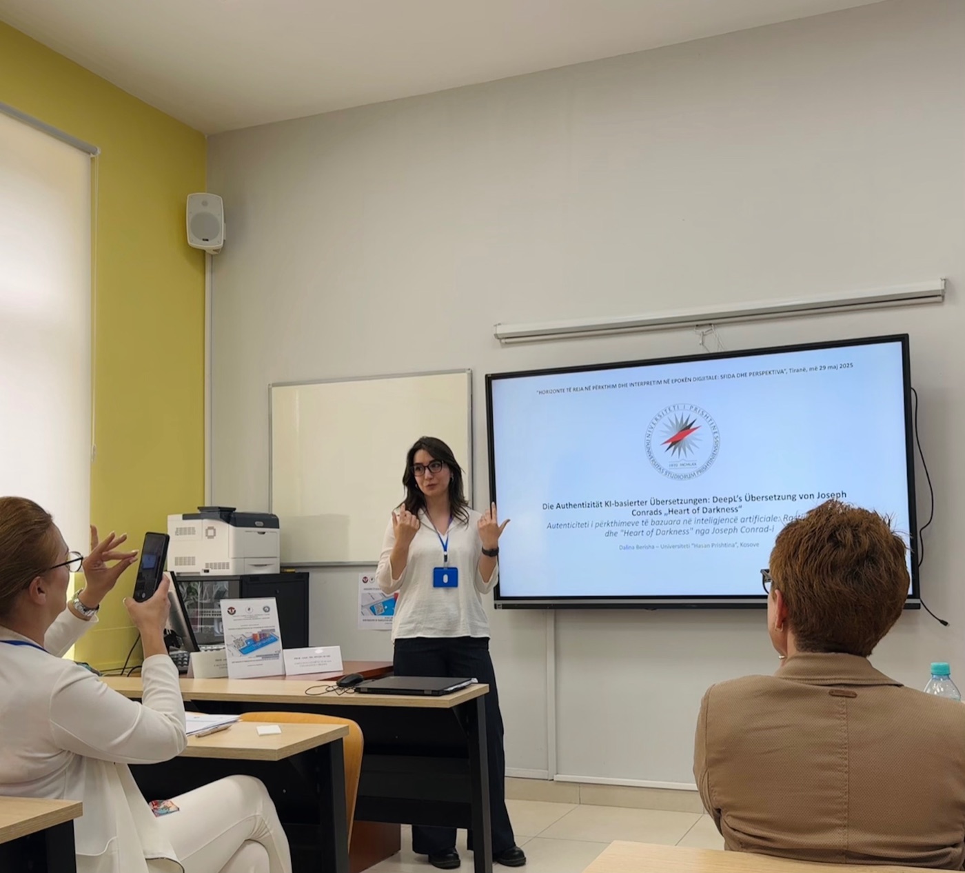 Professor Dalina Berisha giving a presentation